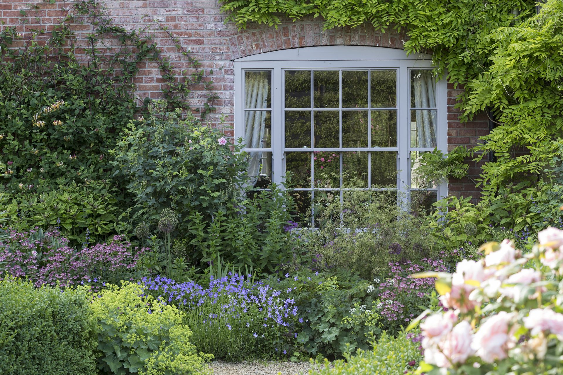 Cottage garden patio ideas: 11 beautiful ways to create a flower-filled seating space | Gardeningetc