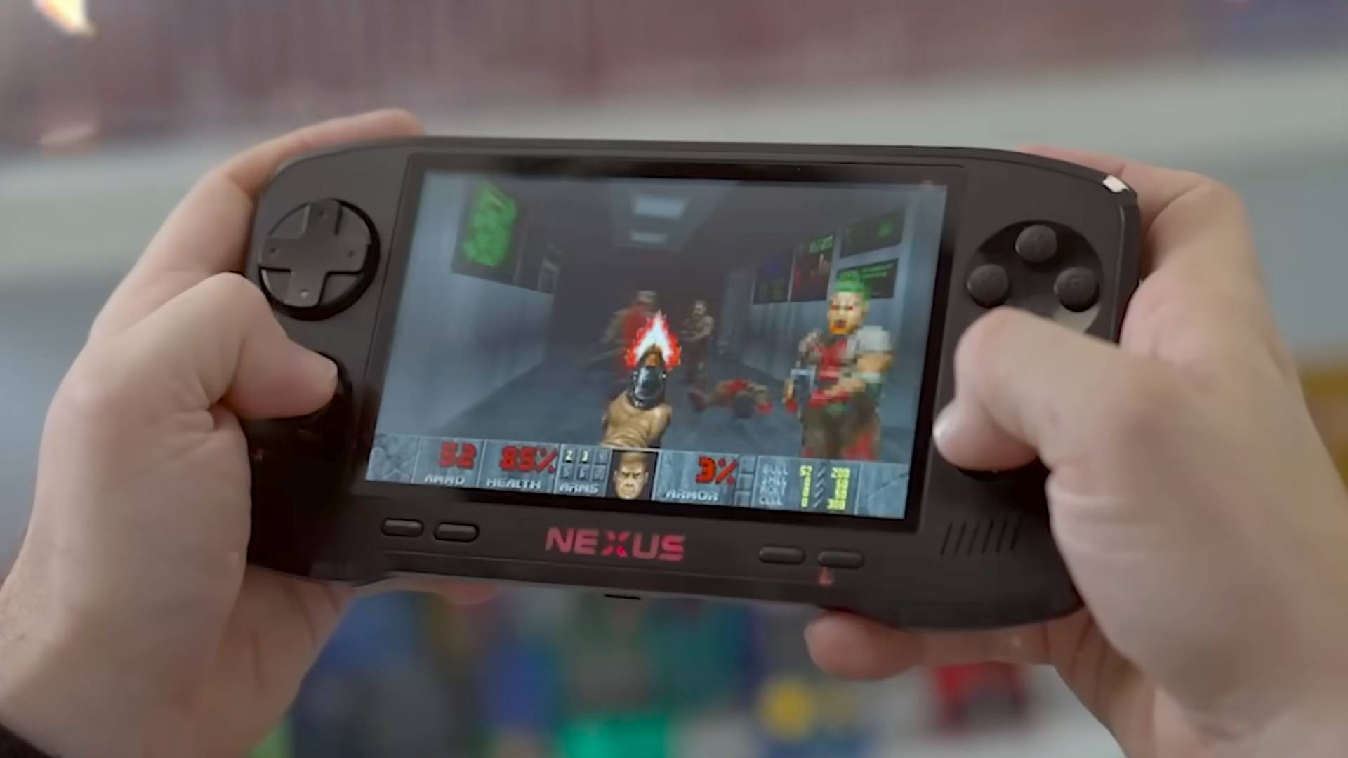 Hands holding Evercade Nexus with DOOM II gameplay on screen.