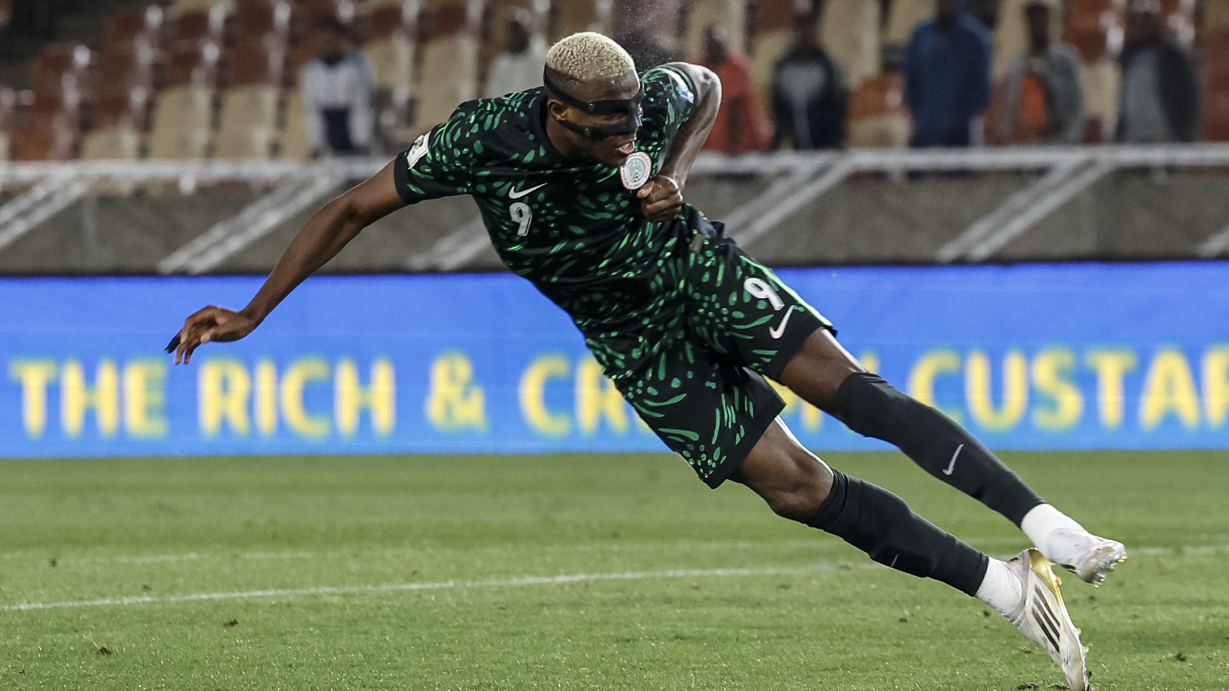 Nigeria&#039;s forward #9 Victor Osimhen heads the ball but fails to score during the FIFA World Cup 2026 Africa qualifiers group C match between Lesotho and Nigeria at the Peter Mokaba Stadium in Polokwane on October 10, 2025. 