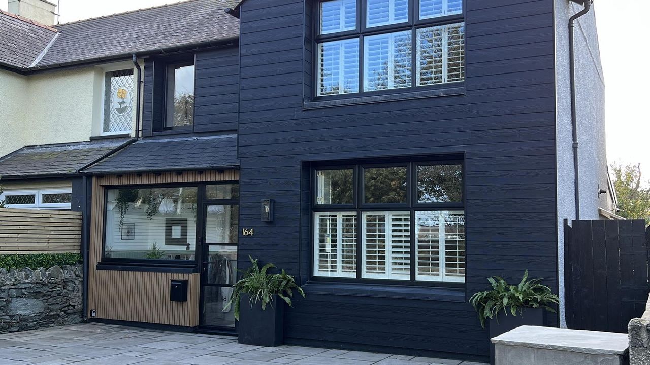 exterior of house with dark grey cladding