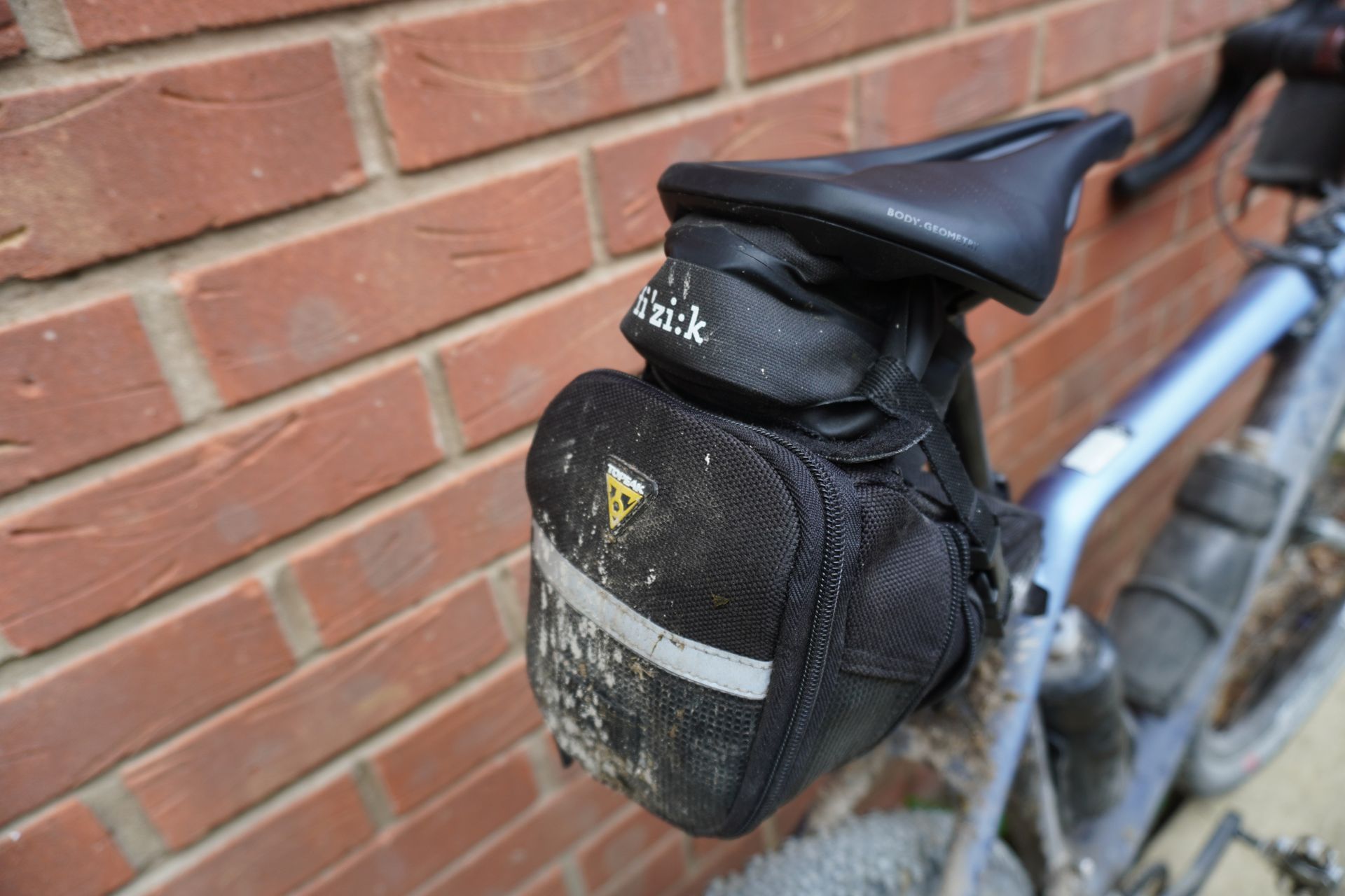 Not a traditional saddlebag setup, but it held fast for the whole 200 miles