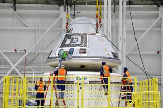 Technicians joined the CST-100 Starliner capsule and its service module on Jan. 14, 2021, in preparation for a second uncrewed test flight to the International Space Station.