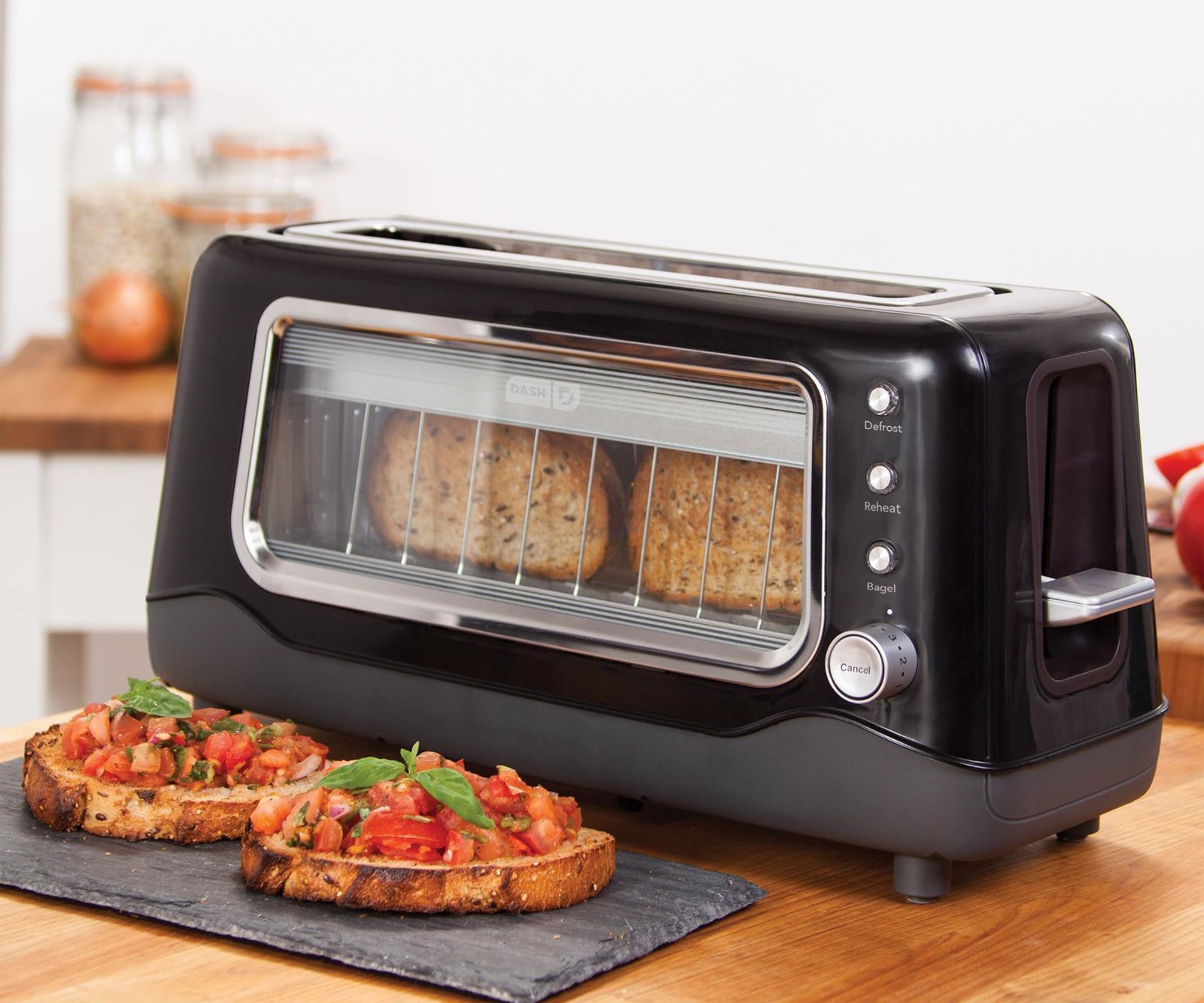 Dash toaster in black on a countertop