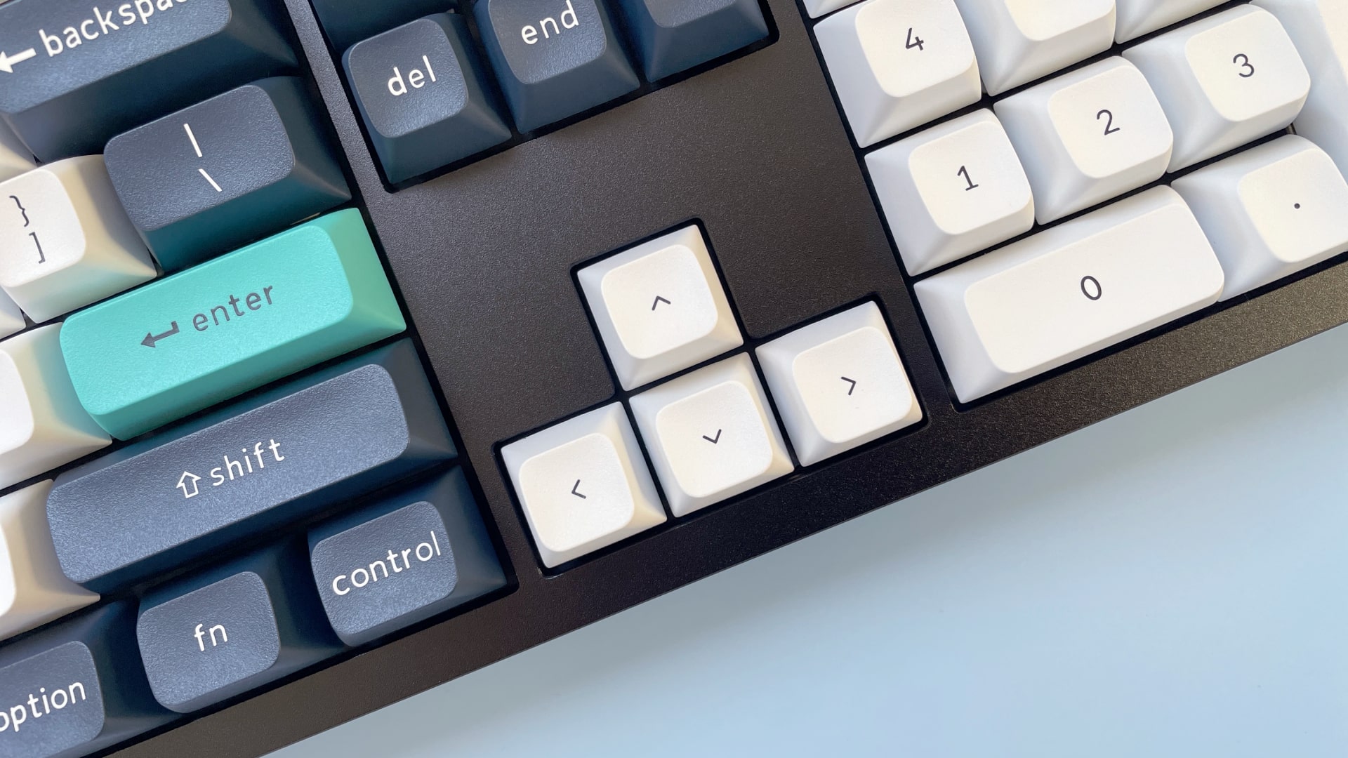 The Keychron Q6 Max mechanical keyboard against a blue background.