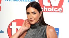 Lisa Snowdon is pictured wearing a high-neck grey glittery dress at the TV Choice Awards 2026 at Hilton Park Lane on February 02, 2026 in London, England.