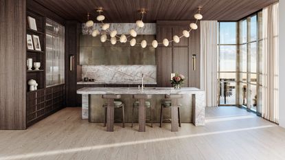 A kitchen designed and light and dark wood, with an oversized pendant light hung above the island