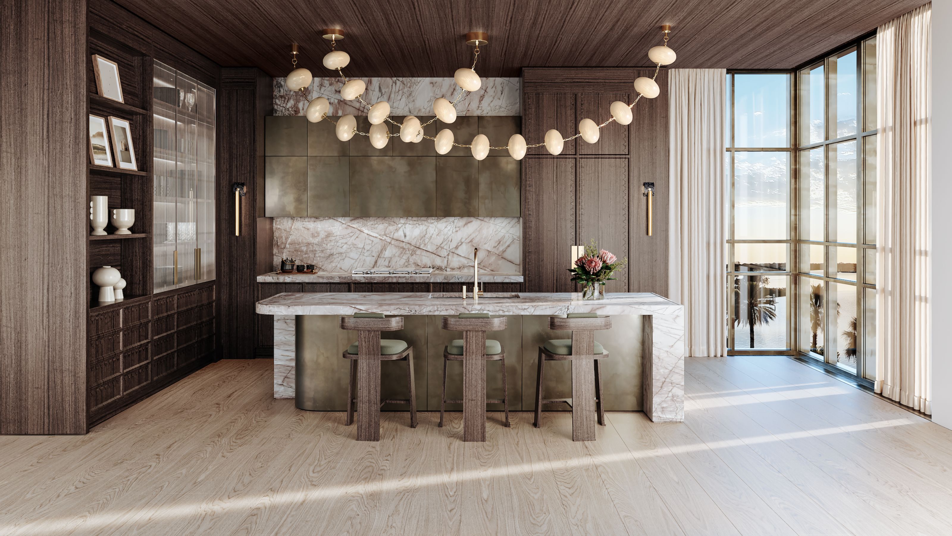 A kitchen designed and light and dark wood, with an oversized pendant light hung above the island 