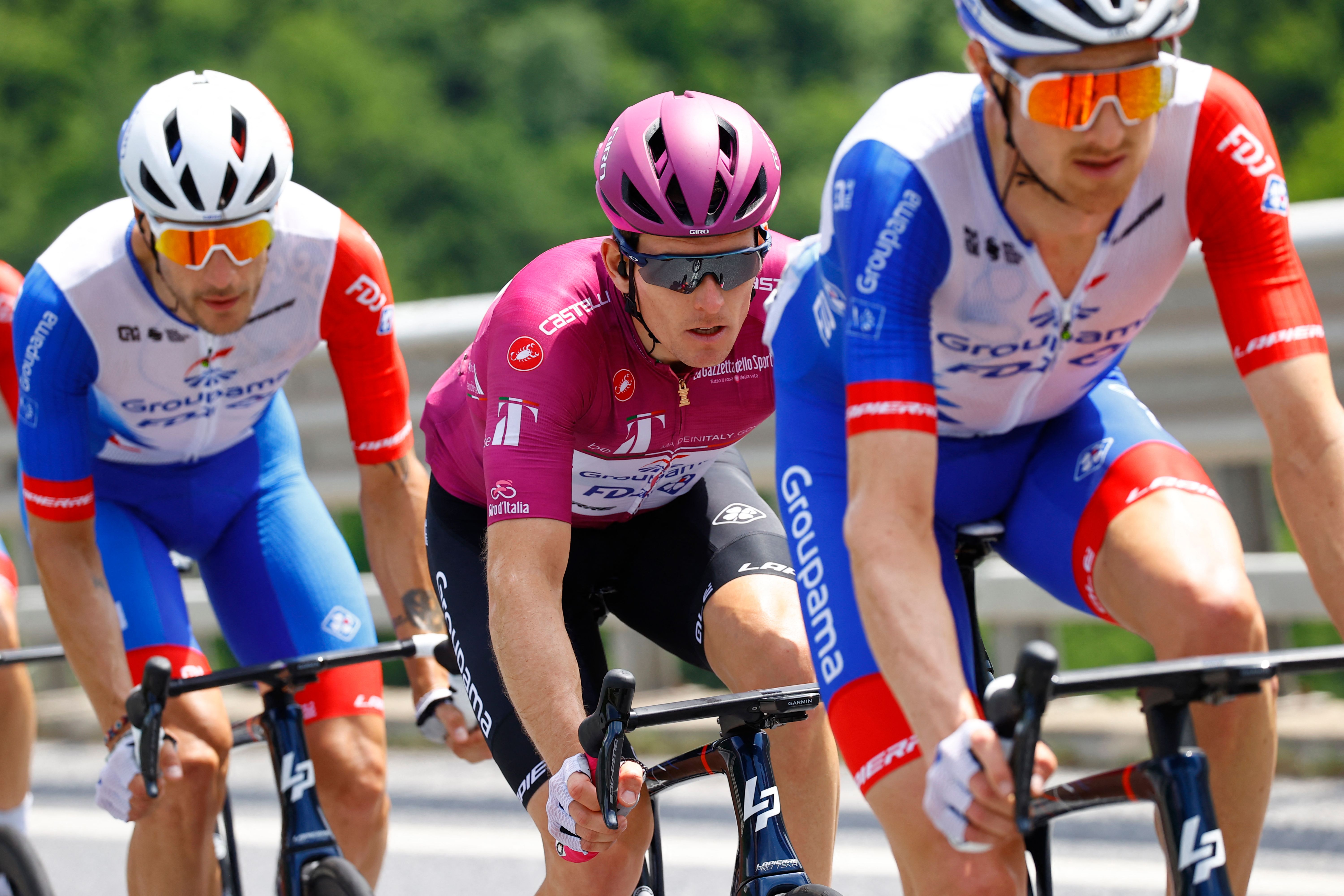 Team GroupamaFDJs French rider Arnaud Demare C wearing the best sprinter cyclamen jersey rides during the 13th stage of the Giro dItalia 2022 cycling race 150 kilometers from San Remo to Cuneo northwestern Italy on May 20 2022 Photo by Luca Bettini AFP Photo by LUCA BETTINIAFP via Getty Images