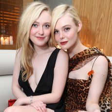 Elle and Dakota Fanning got "arrested" during Sabrina Carpenter's Short n' Sweet concert wearing pastel slip dresses