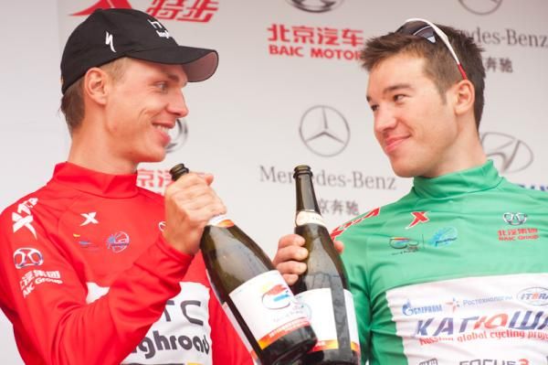 Tony Martin and points classification leader Denis Galimzyanov (r) enjoy a quiet drink on the podium