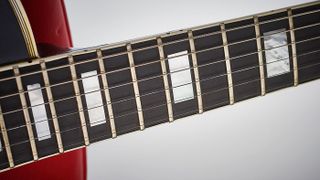 Mother-of-pearl block inlays embellish the (refretted) ebony fretboard. In 1959, Gibson eventually began to replace its original lower, smaller ‘Fretless Wonder’ frets with a larger type in response to customer requests