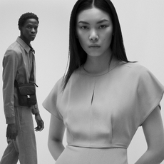 Black and white image of two models wearing Hugo Boss on studio background