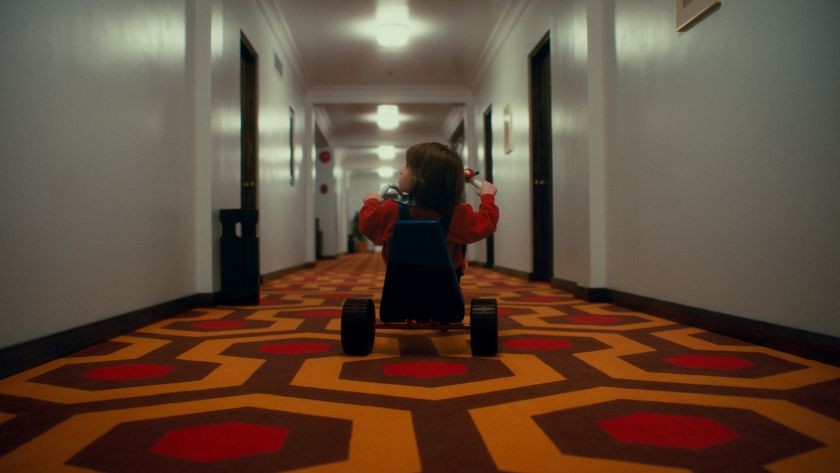 Danny on trike in the Overlook Hotel in Doctor Sleep