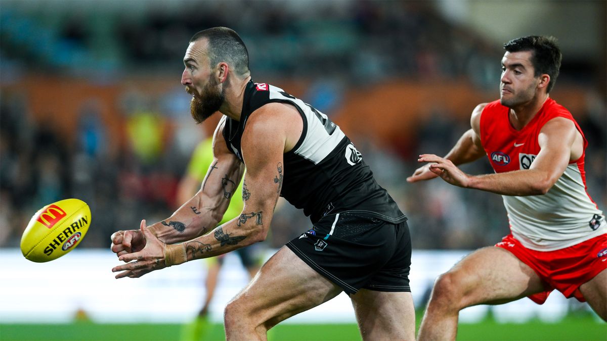 Port Adelaide&#039;s Charlie Dixon handballs in a match against Sydney ahead of the AFL preliminary final 2024 live stream.