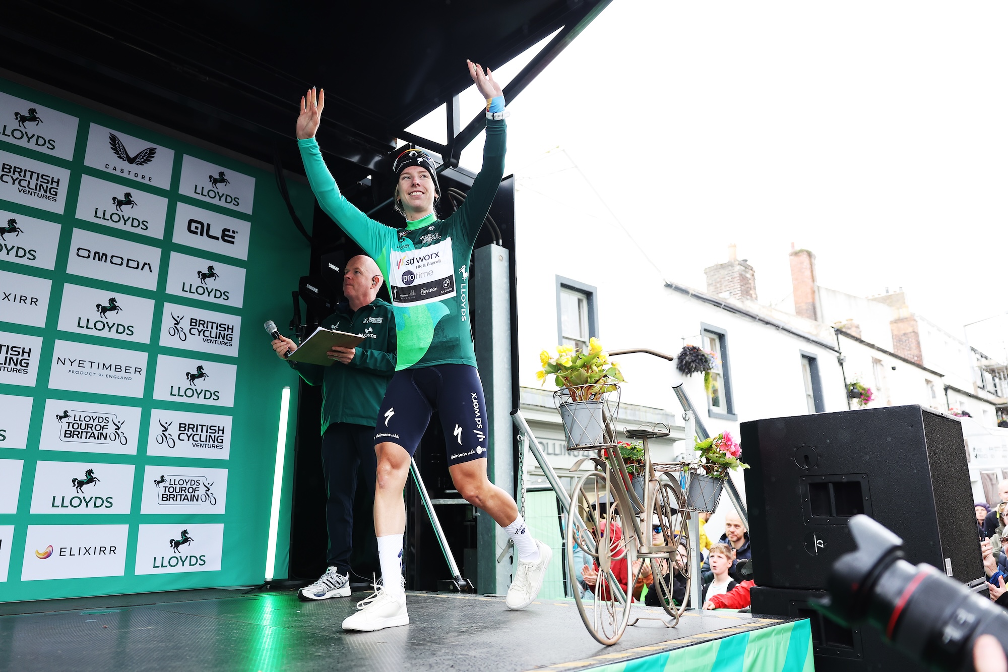 COCKERMOUTH, ENGLAND - AUGUST 19: Lorena Wiebes of Netherlands and Team SD Worx - Protime celebrates at podium as Green Leader Jersey winner during the 11th Lloyds Tour of Britain Women 2026, Stage 1 a 158.9km stage from Cockermouth to Cockermouth / #UCIWWT / on August 19, 2026 in Cockermouth, England. (Photo by Matt McNulty/Getty Images)