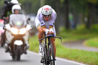 World time trial champion Tony Martin crashed in the wet conditions