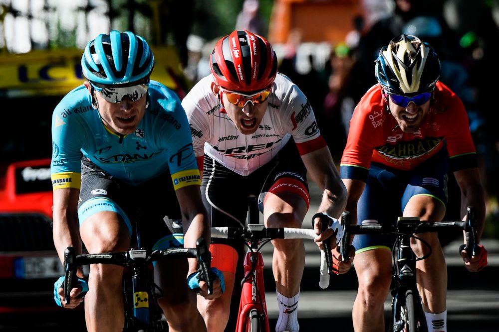 Cort Nielsen, Mollema and Izagirre make their way to the finish near the end of stage 15