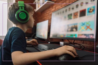 boy sat at computer