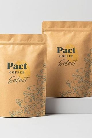 two bags of Pact Coffee bags on a white surface