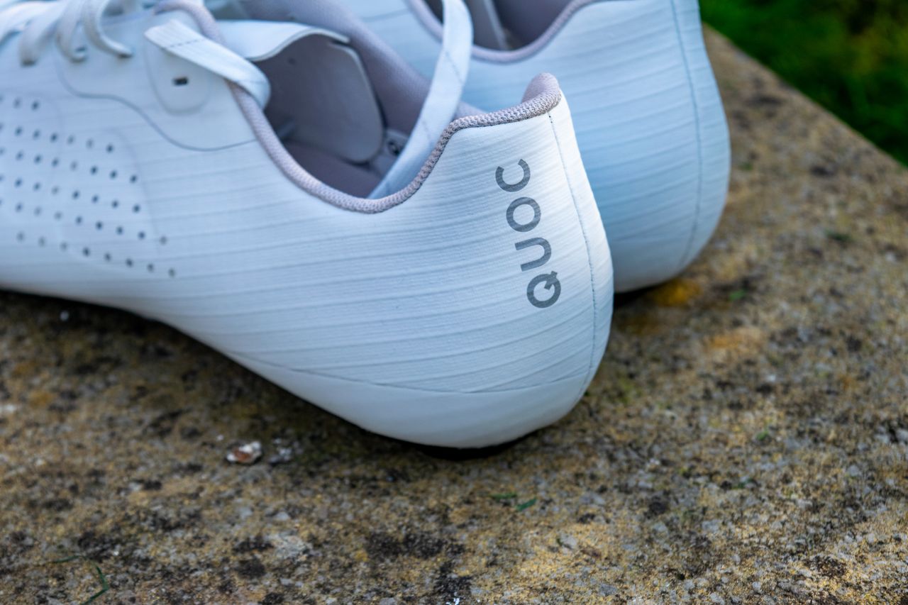 A pair of white Quoc M Pro Lace shoes