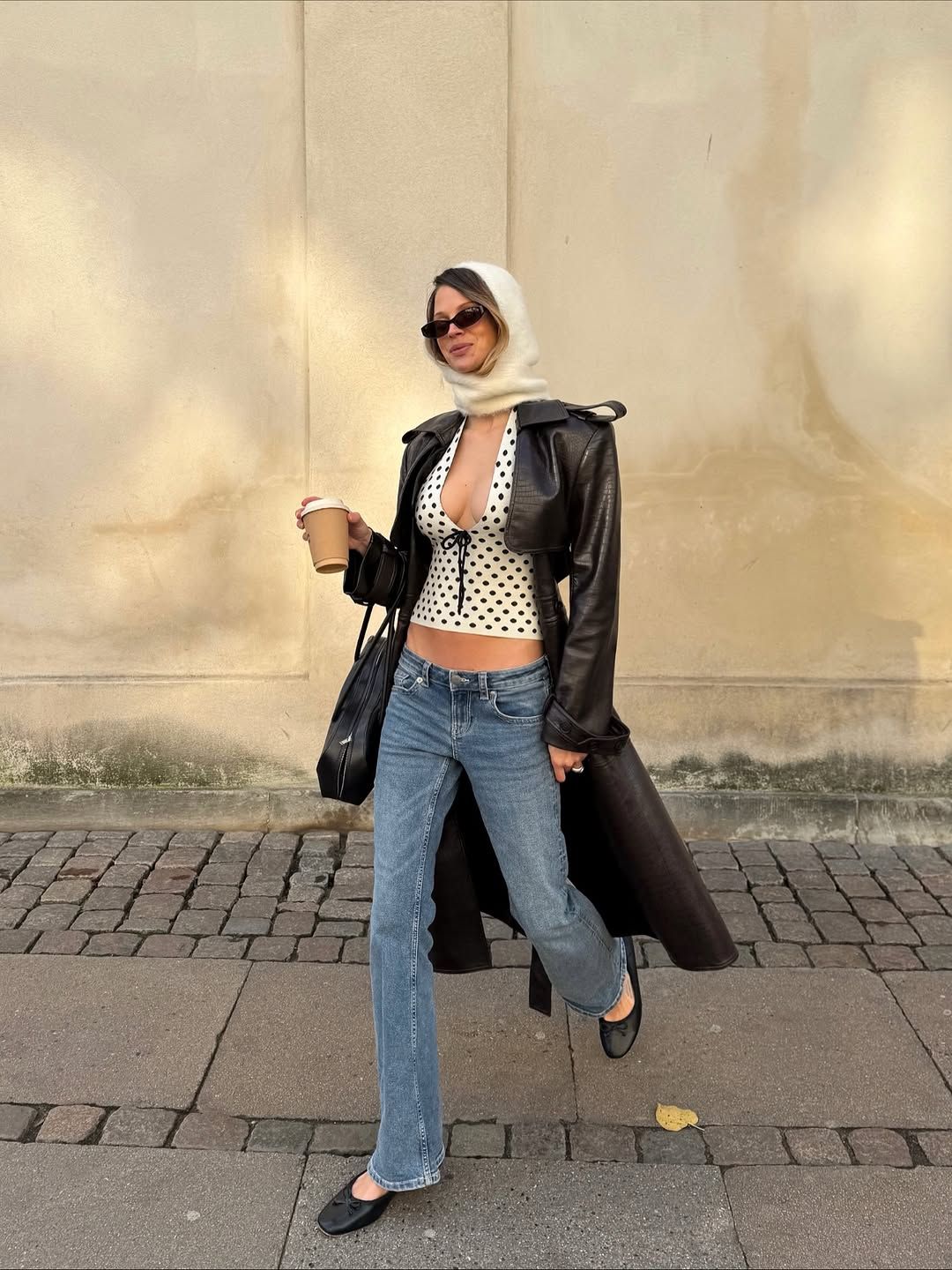 woman wearing holiday denim outfit 2025