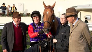 The Queen faces double heartache, Trainer Nicky Henderson, Jockey Barry Geraghty and Sir Michael Oswald (r) pose with Queen Elizabeth II's horse Close Touch after winning the Introductory Hurdle Race at Ascot Racecourse on November 23, 2012 in Ascot, England.