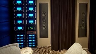 McIntosh amps and in-wall speakers at the House of Sound's home theater