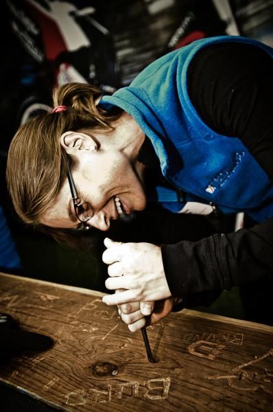 Lauren Hall tries to carve her new team name.jpg