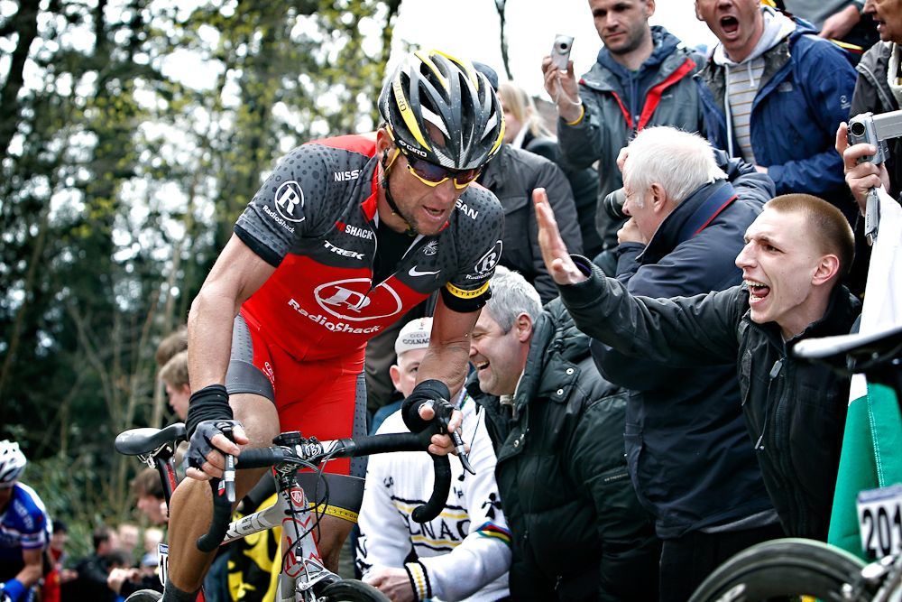 Lance Armstrong climbs during the 2010 Tour of Flanders.