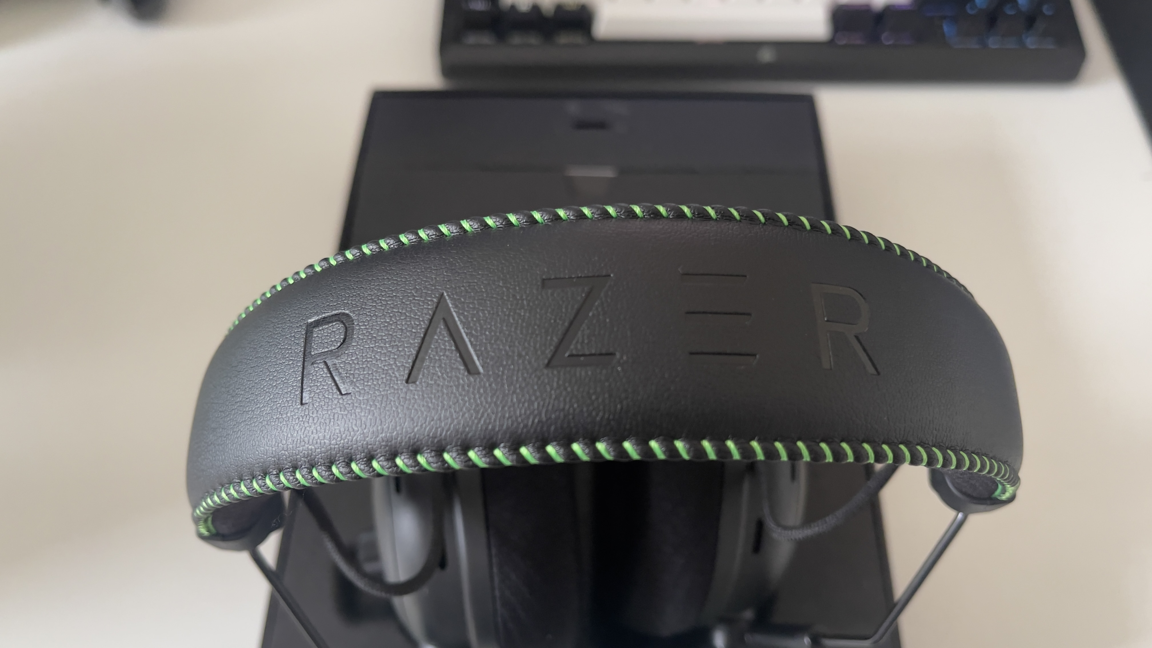 The Razer BlackShark V3 Pro headset on a desk