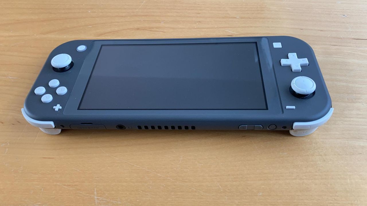 A full shot of the Nintendo Switch Lite in the shade 'Grey'
