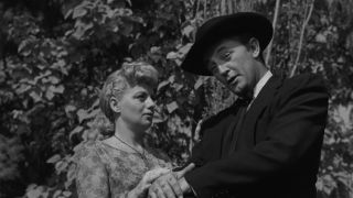 Shelley Winters' Willa inraptured by Robert Mitchum's Preacher Harry Powell in The Night of the Hunter (1955)