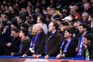 Some fans were permitted to stand at Stamford Bridge