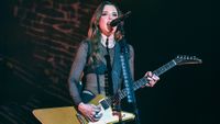 Lzzy Hale of Halestorm performs on stage at the OVO Arena Wembley on December 09, 2023 in London, England. 