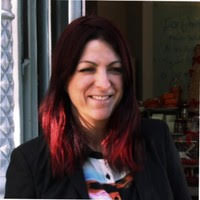 woman with red hair smiling