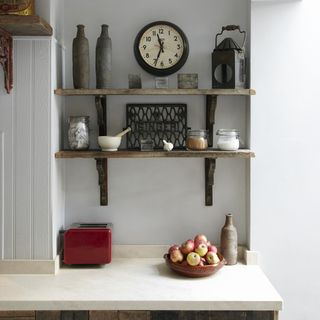 kitchen shelves with clock