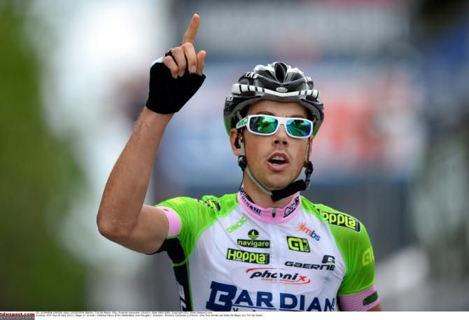 Marco Canola takes his first Grand Tour victory