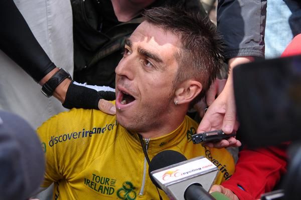 Well wishers and quote hunters huddled around Downing as he took a few minutes to compose himself and take it all in.