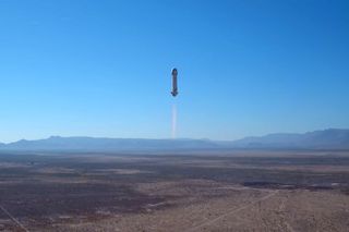The New Shepard 2.0 suborbital vehicle rises into the West Texas skies during its first test flight, on Dec. 12, 2017.