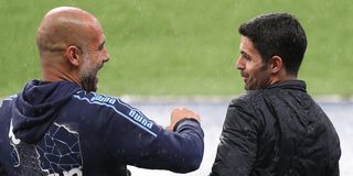 Arsenal manager Mikel Arteta and Manchester City manager Pep Guardiola prior to the Premier League match between Manchester City and Arsenal FC at Etihad Stadium on June 17, 2020 in Manchester, United Kingdom.