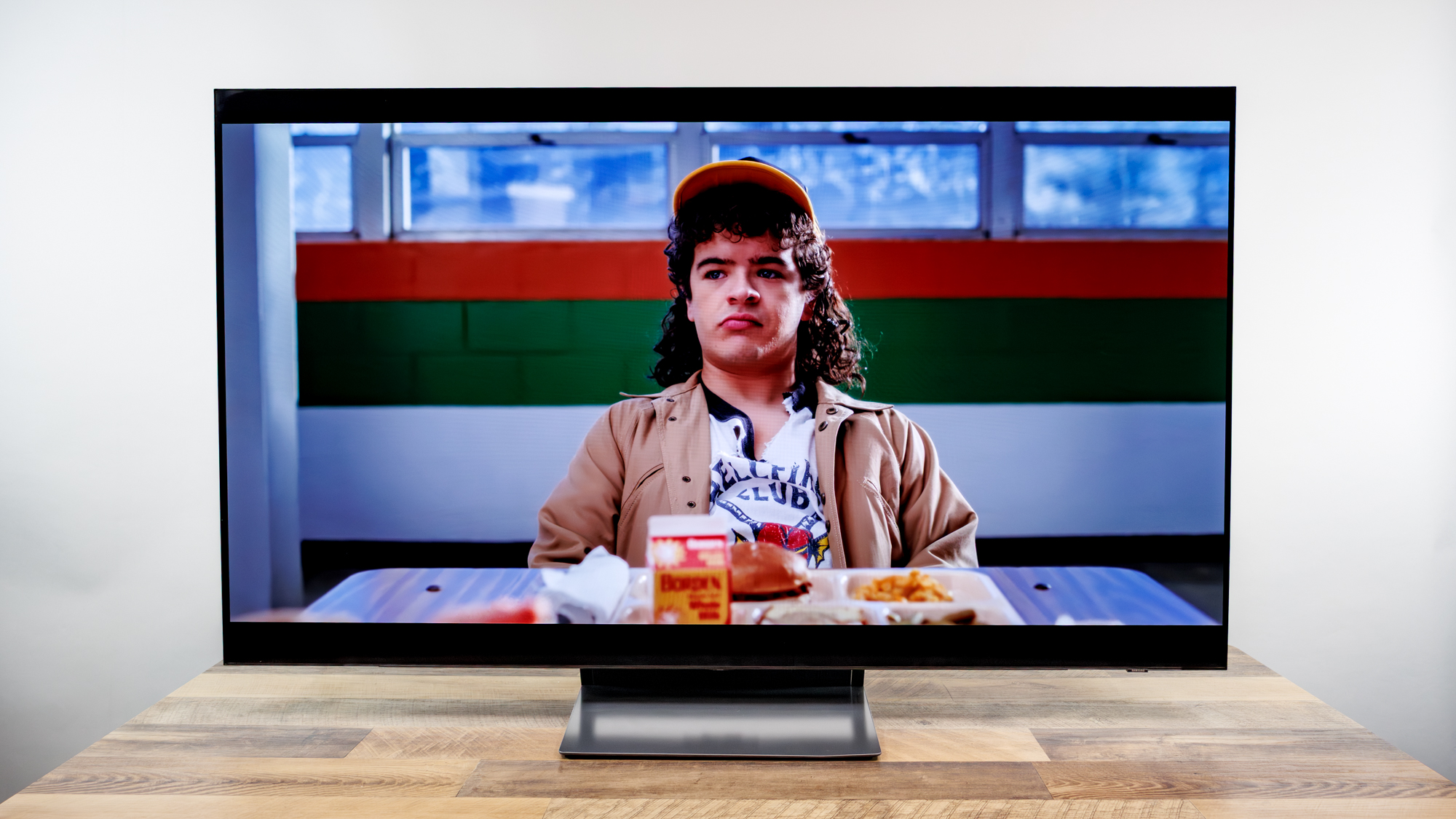 Samsung OLED S90H 4K TV on a desk