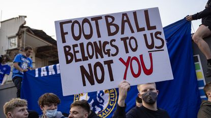 Chelsea FC fans protest against the proposed European Super League