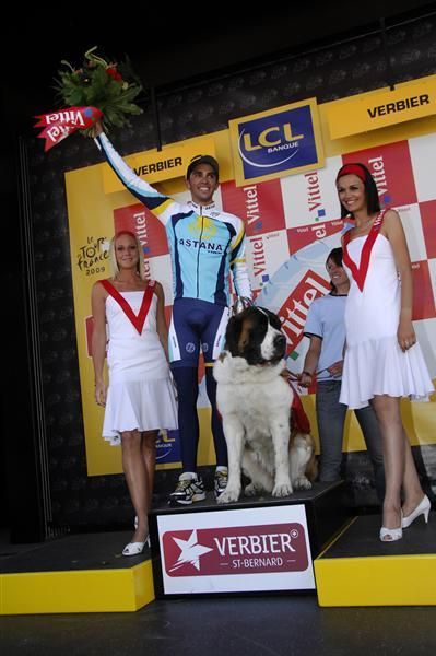 Alberto Contador (Astana) with the Tour's newest podium attendant