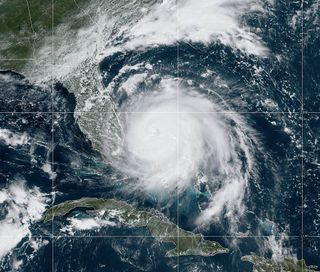 Hurricane Dorian churns over the island of Grand Bahama, about 110 miles east of West Palm Beach, Florida, on Sept. 2, 2019.