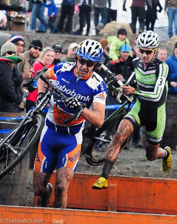 Adam Craig (Rabobank Giant) leading Jamey Driscoll over the barriers.