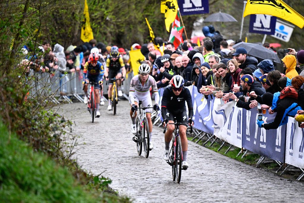 Belgian Lotte Kopecky of SD Worx - Protime (C) competes in the women's race of the 'Ronde van Vlaanderen' (Tour des Flandres) one day cycling race, 163 km from Oudenaarde to Oudenaarde, on March 31, 2024. (Photo by JASPER JACOBS / Belga / AFP) / Belgium OUT