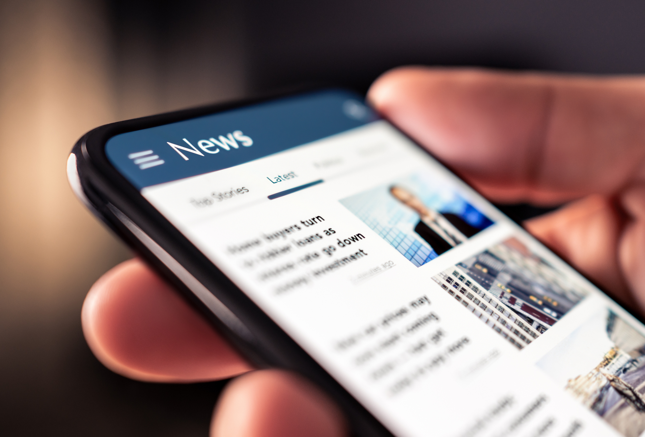 A news feed displayed on a cell phone.