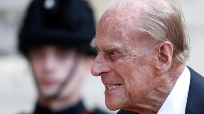 Prince Philip reacts with rage, Duke of Edinburgh passes a bugler during the transfer of the Colonel-in-Chief of The Rifles at Windsor castle on July 22, 2020 in Windsor, England.