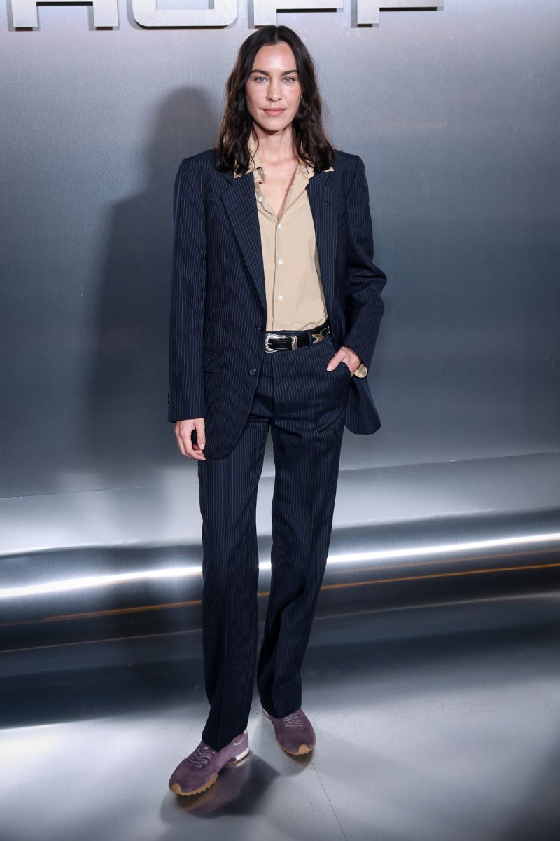 Alexa Chung in pinstripe suit and trainers