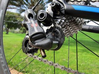 The Campagnolo Super Record EPS rear derailleur is rife with carbon fiber.